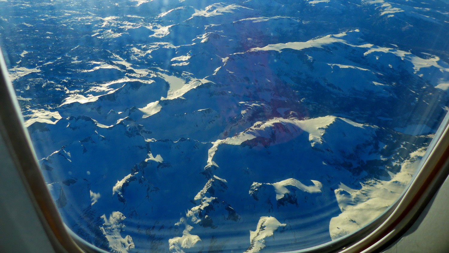 Snowy Rocky Mountains seen from our flight Las Vegas to Frankfurt